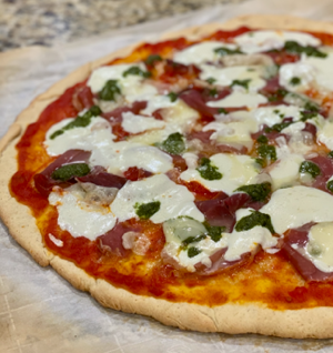 Gluten-Free Prosciutto, Mozzarella and Pesto Pizza thumbnail